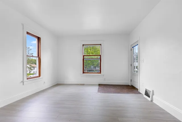 an empty room with windows