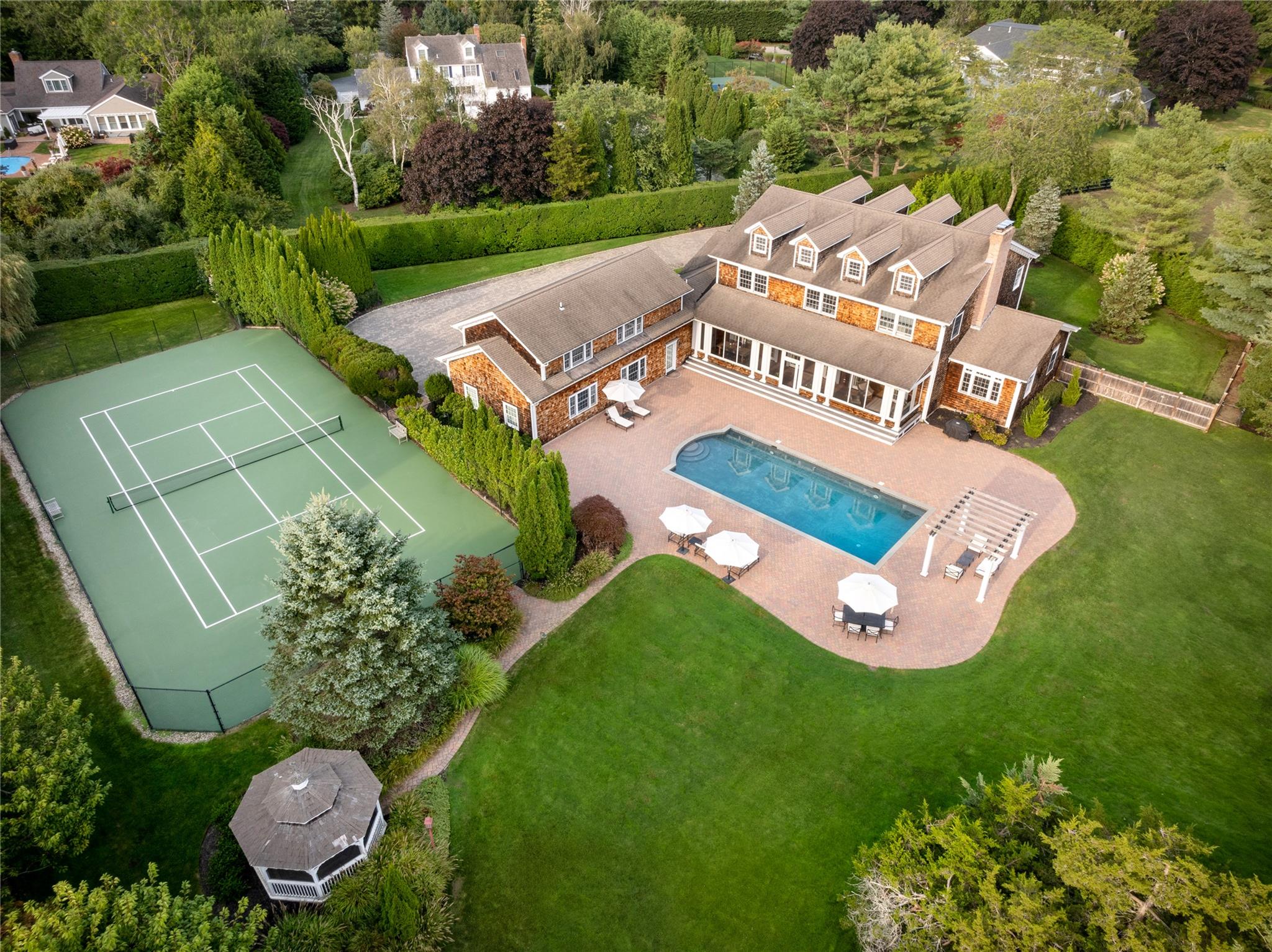 an aerial view of a house with garden space sitting space