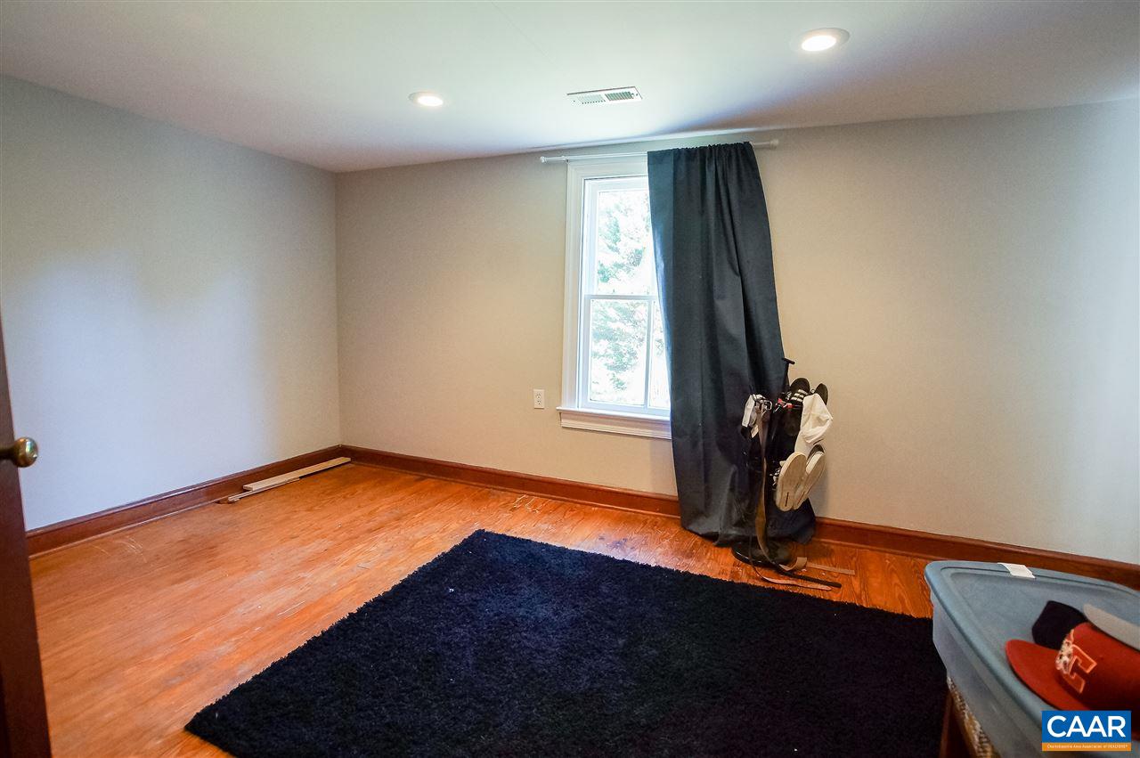3759 Courthouse Road Louisa, VA 23093 - Photo 17 of 29 a view of a room with gym equipment and wooden floor