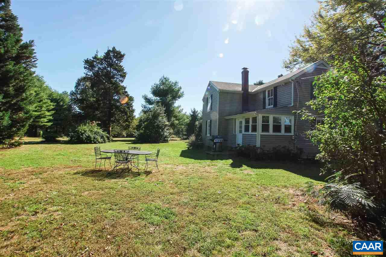 3759 Courthouse Road Louisa, VA 23093 - Photo 27 of 29 a view of a garden with a bench