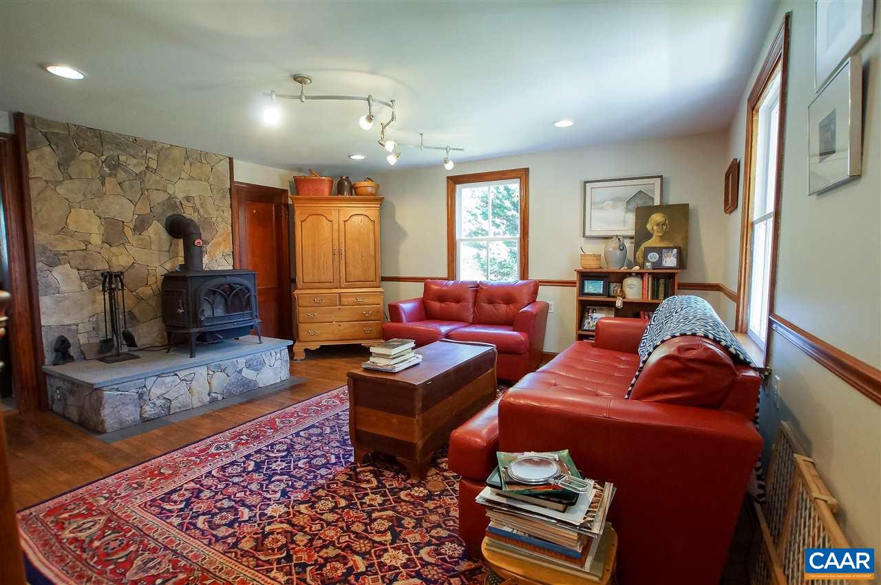 3759 Courthouse Road Louisa, VA 23093 - Photo 5 of 29 a living room with furniture and a fireplace