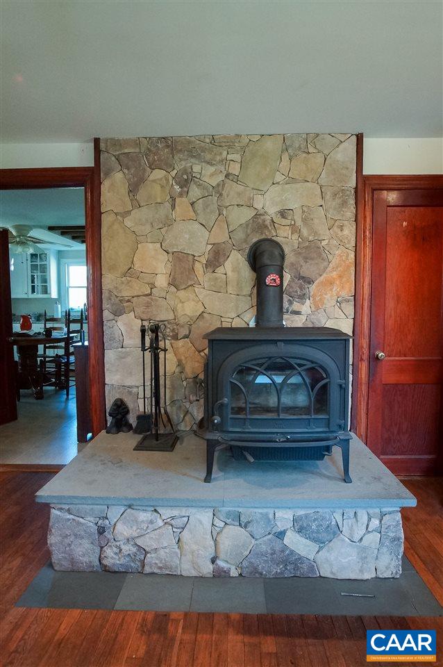3759 Courthouse Road Louisa, VA 23093 - Photo 6 of 29 a living room with furniture and a fireplace