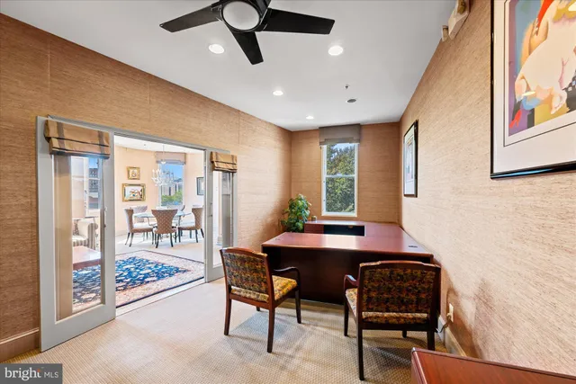 a workspace with furniture and a window