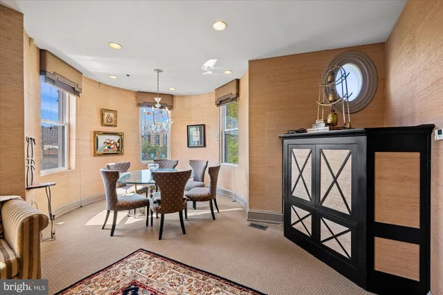 a view of a livingroom with furniture and furniture