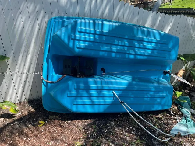 a view of swimming pool with chairs