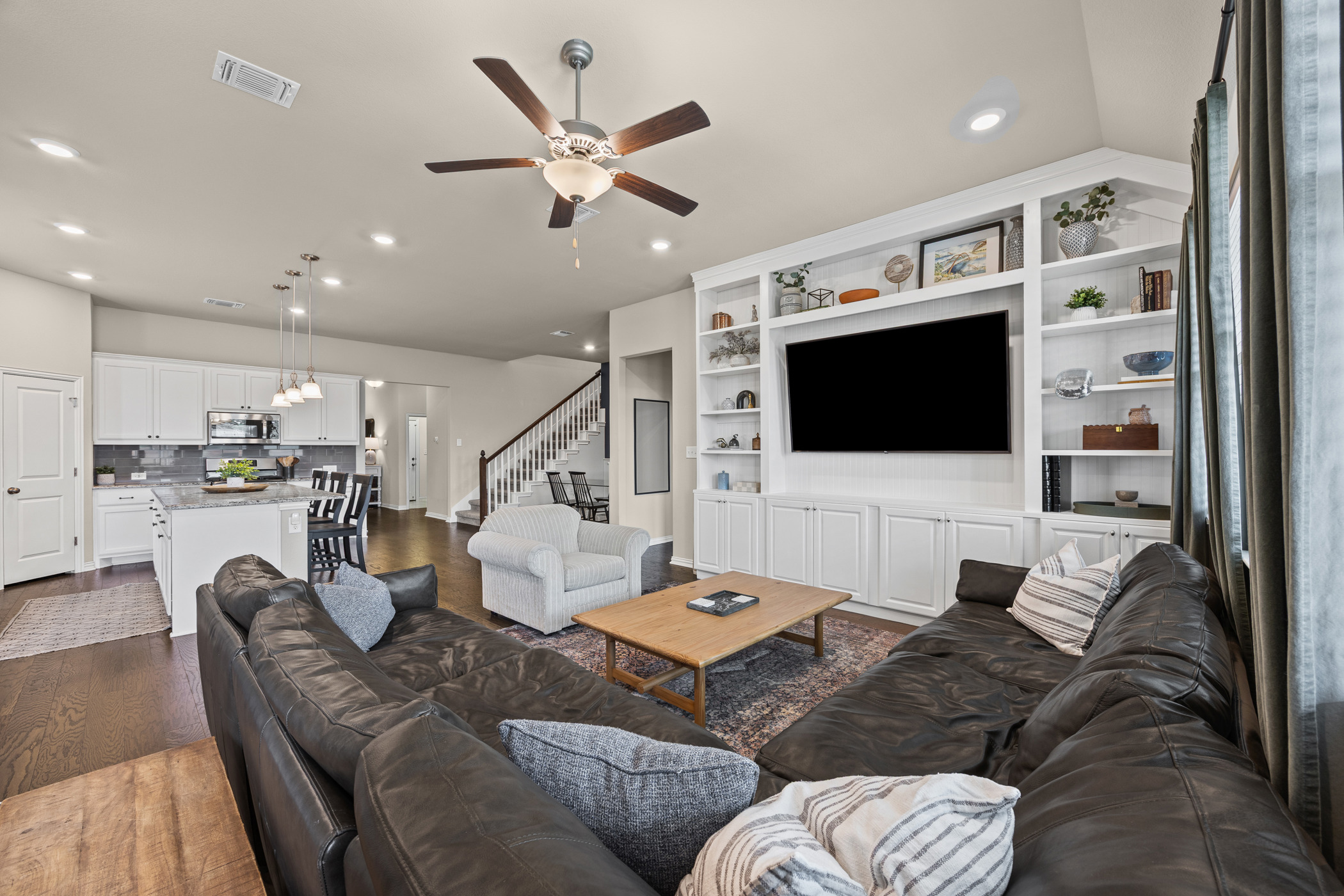 631 Turquoise Drive Dripping Springs, TX 78620 - Photo 8 of 23 Thoughtfully designed open layout that brings the kitchen, dining, and living spaces together.