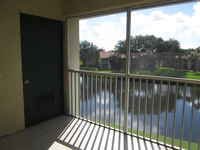 a view of a lake with a building in the background