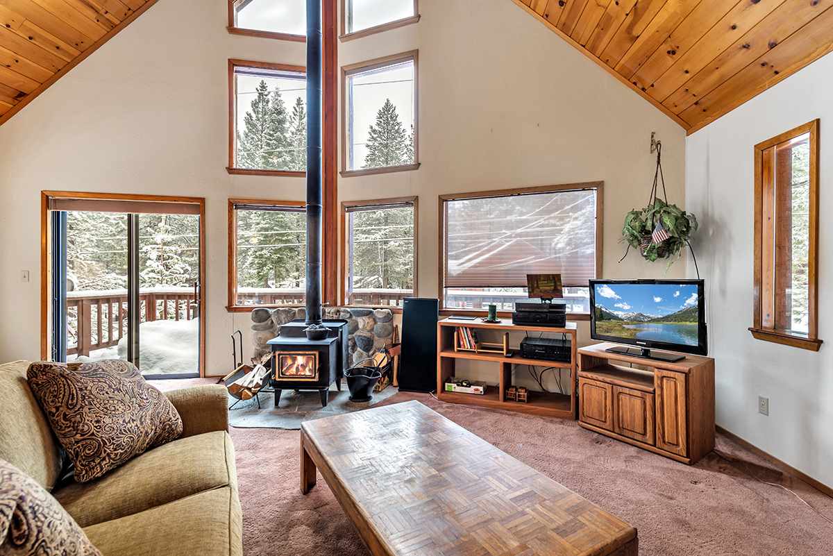 11780 Oslo Drive Truckee, CA 96161 - Photo 2 of 21 a living room with furniture and a large window