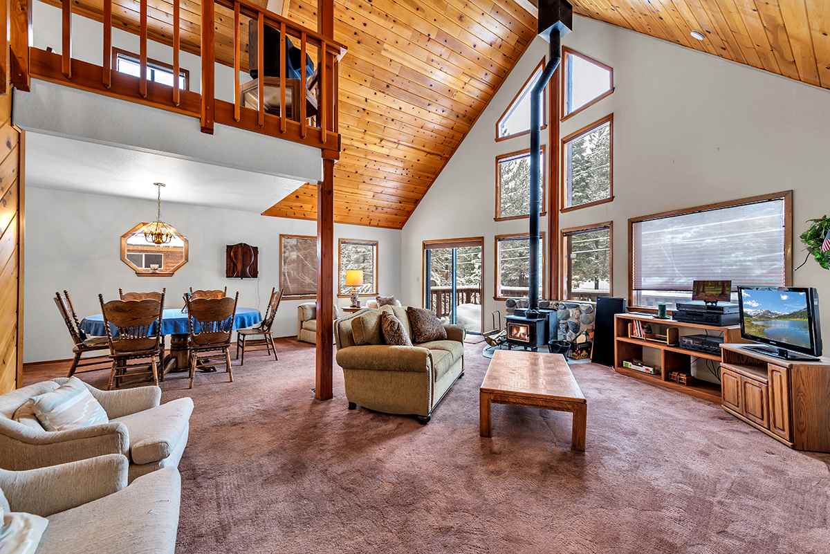 11780 Oslo Drive Truckee, CA 96161 - Photo 3 of 21 a living room with furniture and a large window