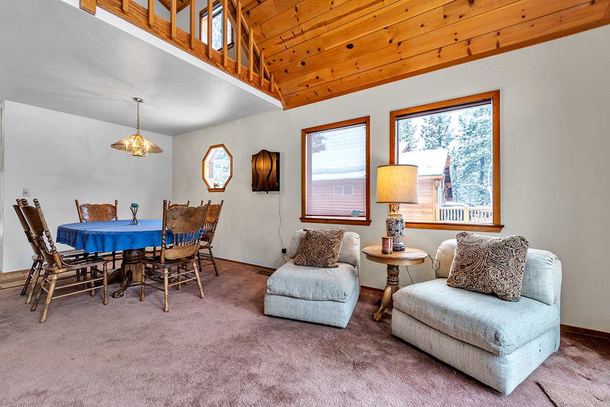 11780 Oslo Drive Truckee, CA 96161 - Photo 5 of 21 a living room with furniture and a large window