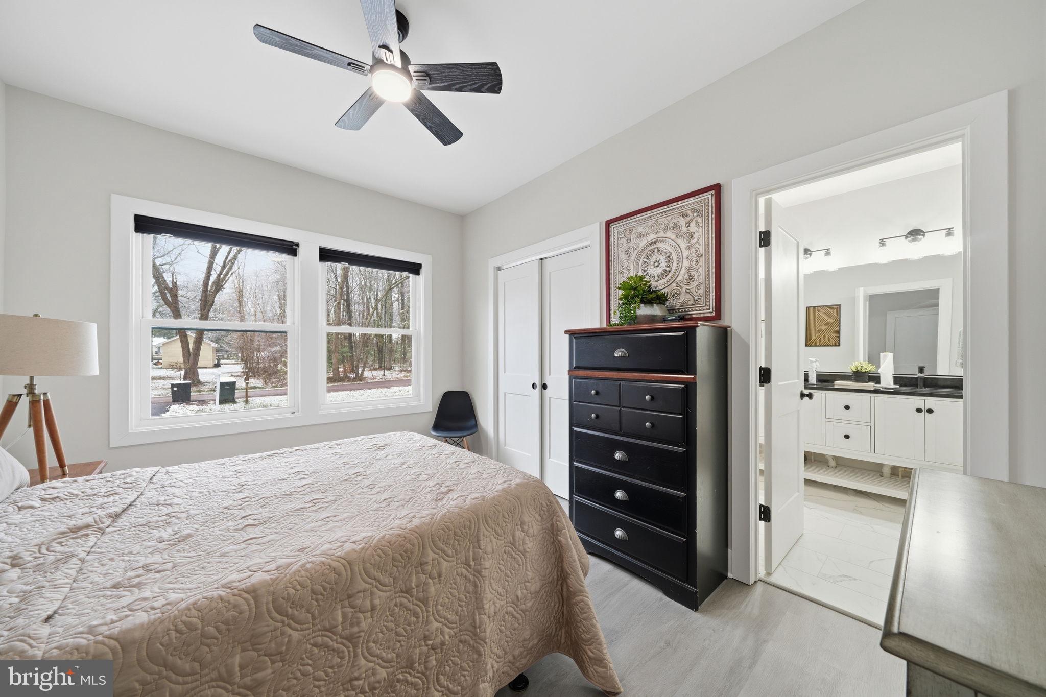 107 Pinewood Lane Colonial Beach, VA 22443 - Photo 17 of 25 a bedroom with a bed and a dresser