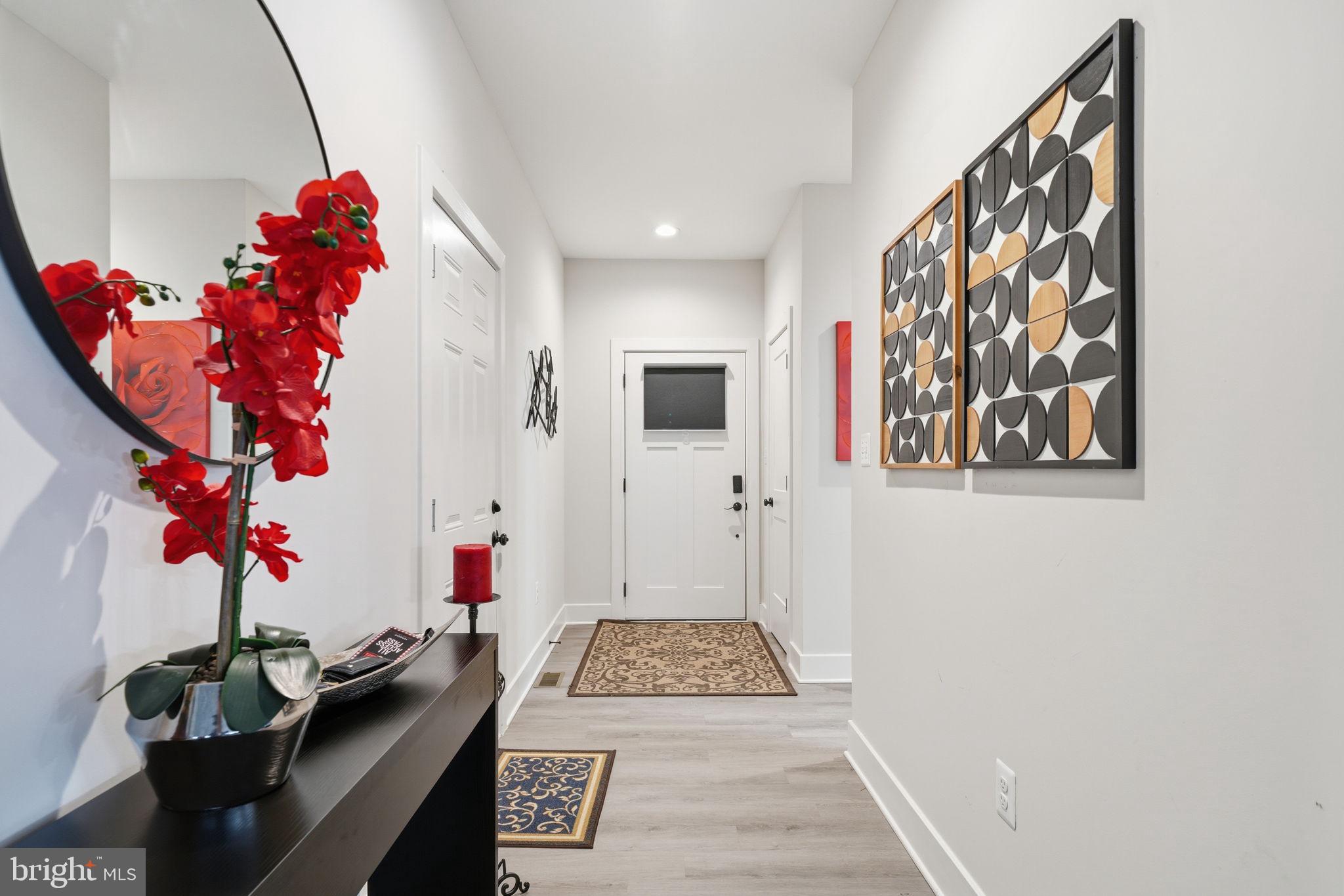 107 Pinewood Lane Colonial Beach, VA 22443 - Photo 2 of 25 a living room with furniture and a couch