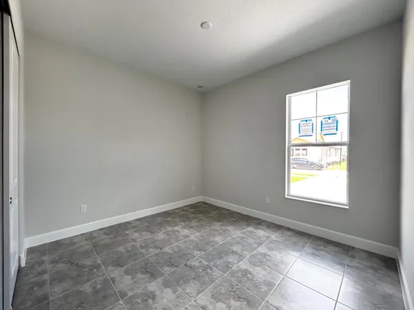 an empty room with windows
