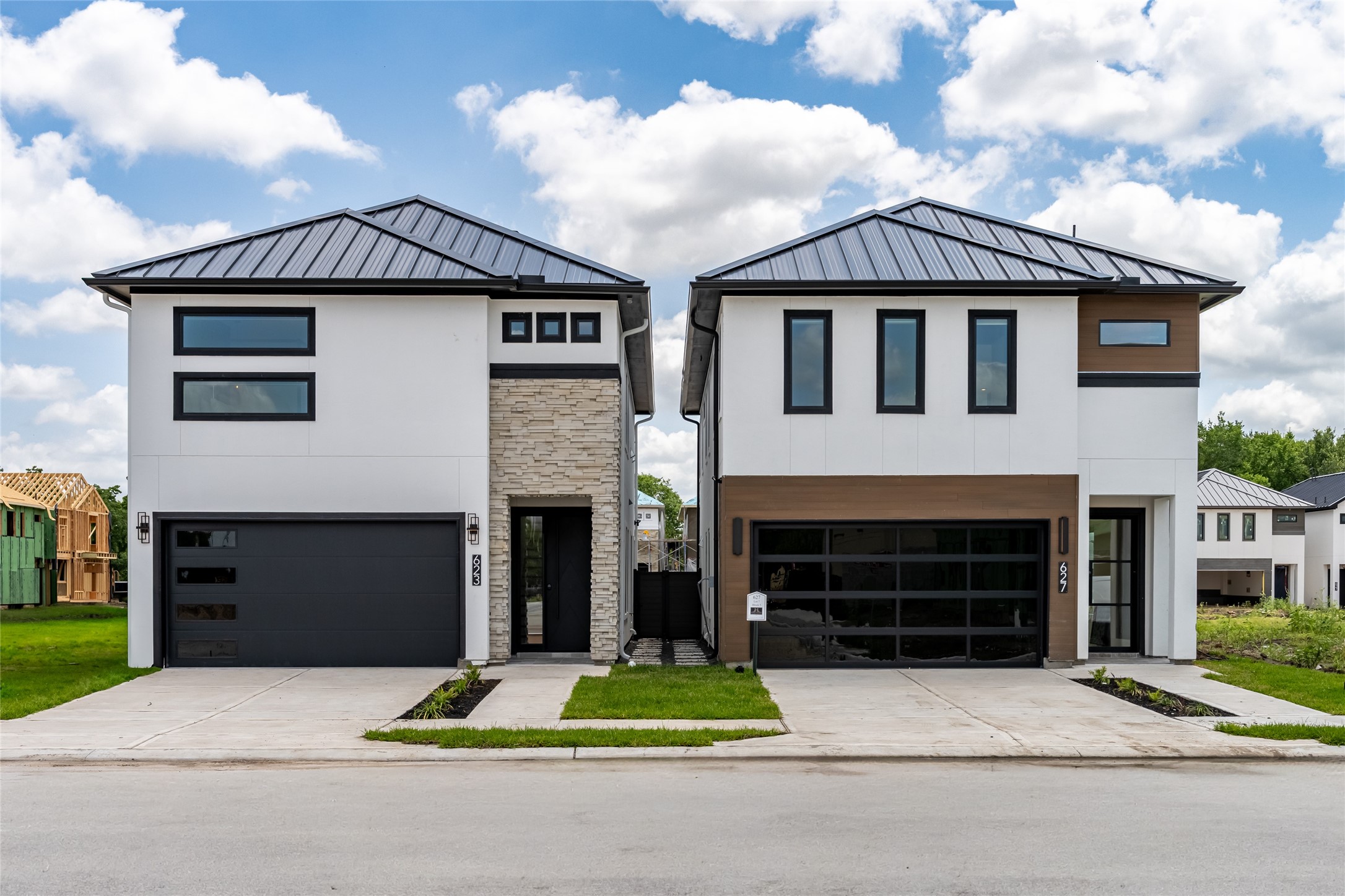 623 Rolling Oaks Stafford, TX 77477 - Photo 2 of 50 Designer-grade metal roof, energy-efficient 2x6 exterior walls, and upscale contemporary finishes define the lasting quality of this custom-built home