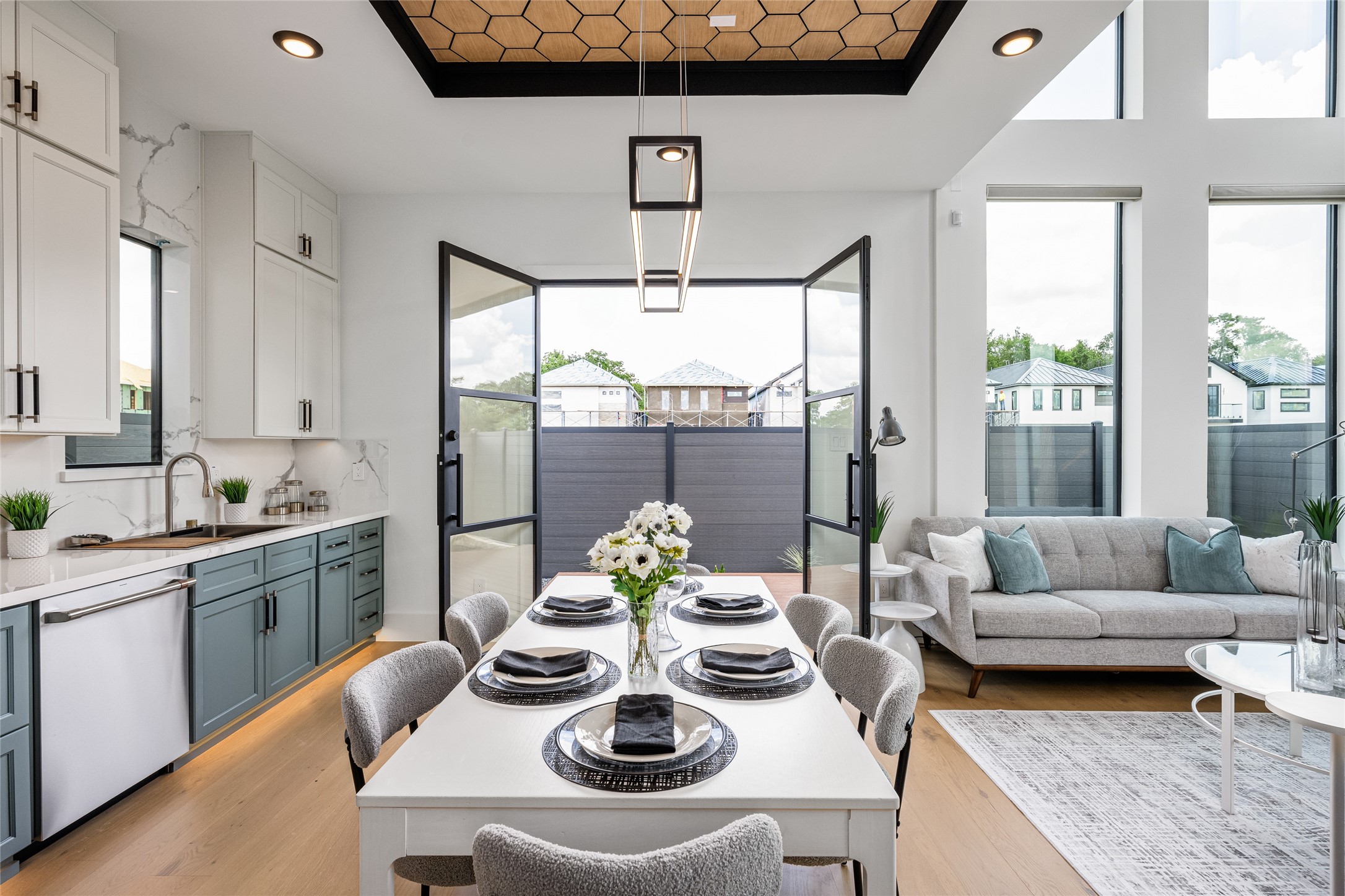 623 Rolling Oaks Stafford, TX 77477 - Photo 25 of 50 A 6-ft iron and glass door opens to the tranquil, beautifully hardscaped backyard