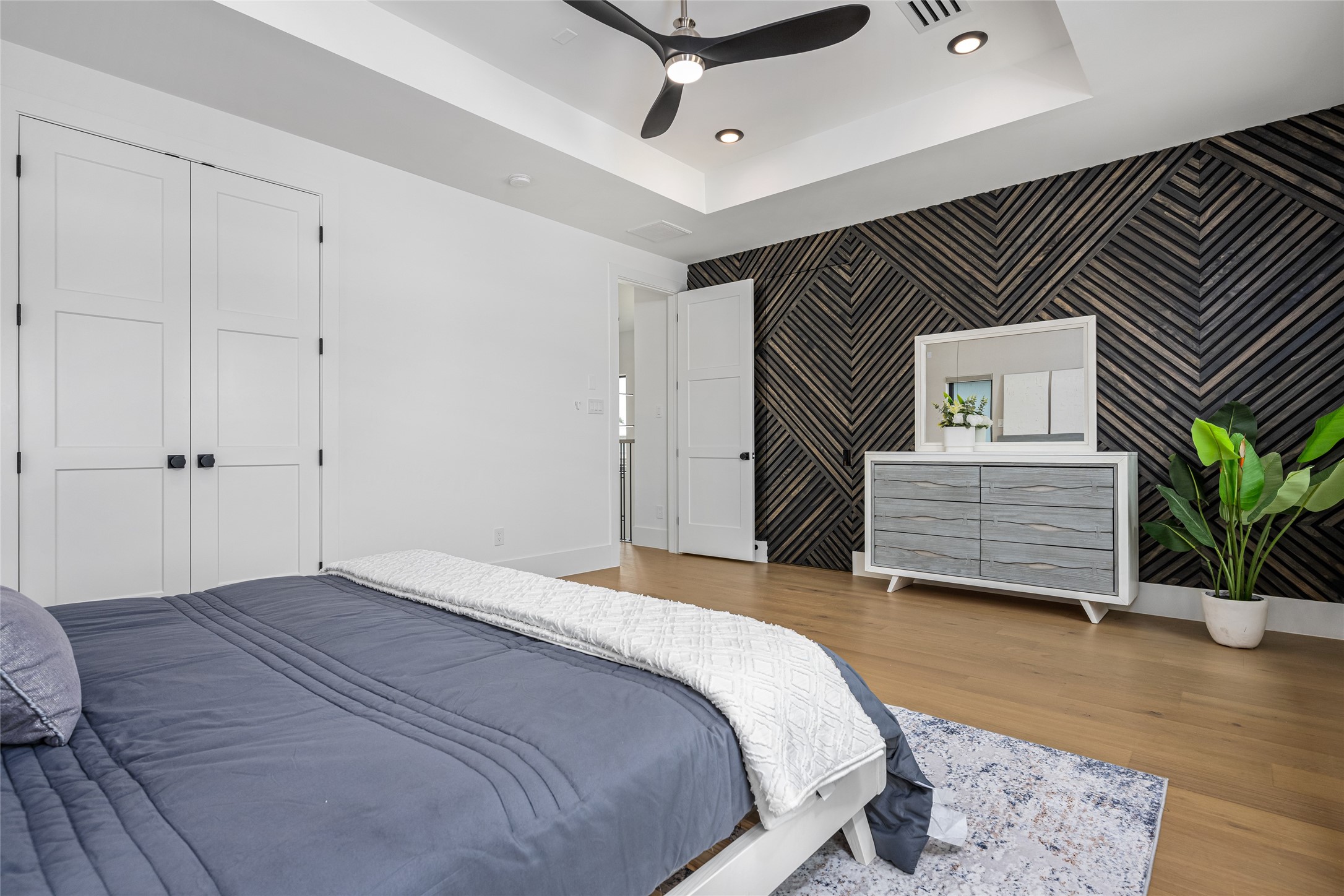 623 Rolling Oaks Stafford, TX 77477 - Photo 34 of 50 Optional paneling with hidden door access to the en-suite bath adds flair and functionality