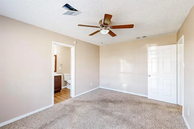 a bathroom with a sink vanity and a mirror