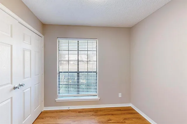 a view of an empty room with window