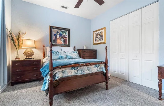 a view of a livingroom with table and chairs