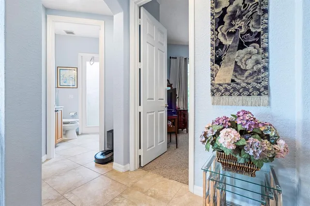 a view of a balcony with furniture