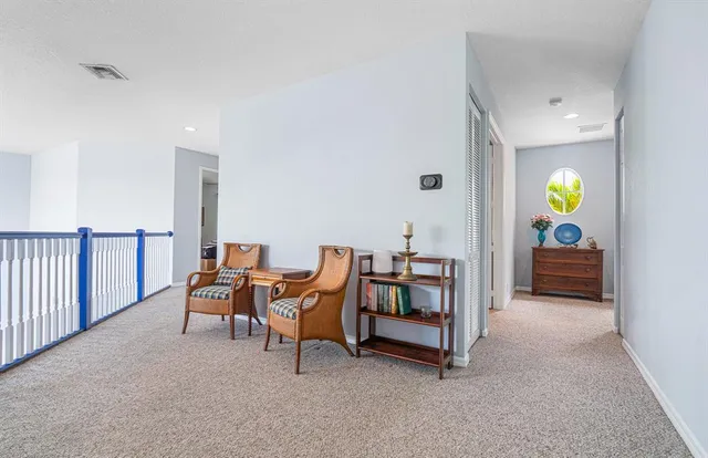 a bathroom with a granite countertop sink a mirror a bathtub and shower