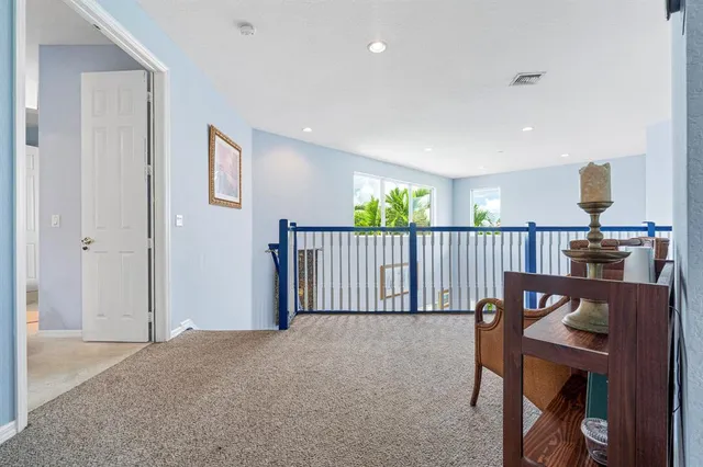 a view of hallway with stairs