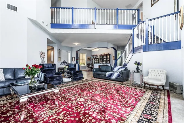 a view of livingroom with furniture and toys