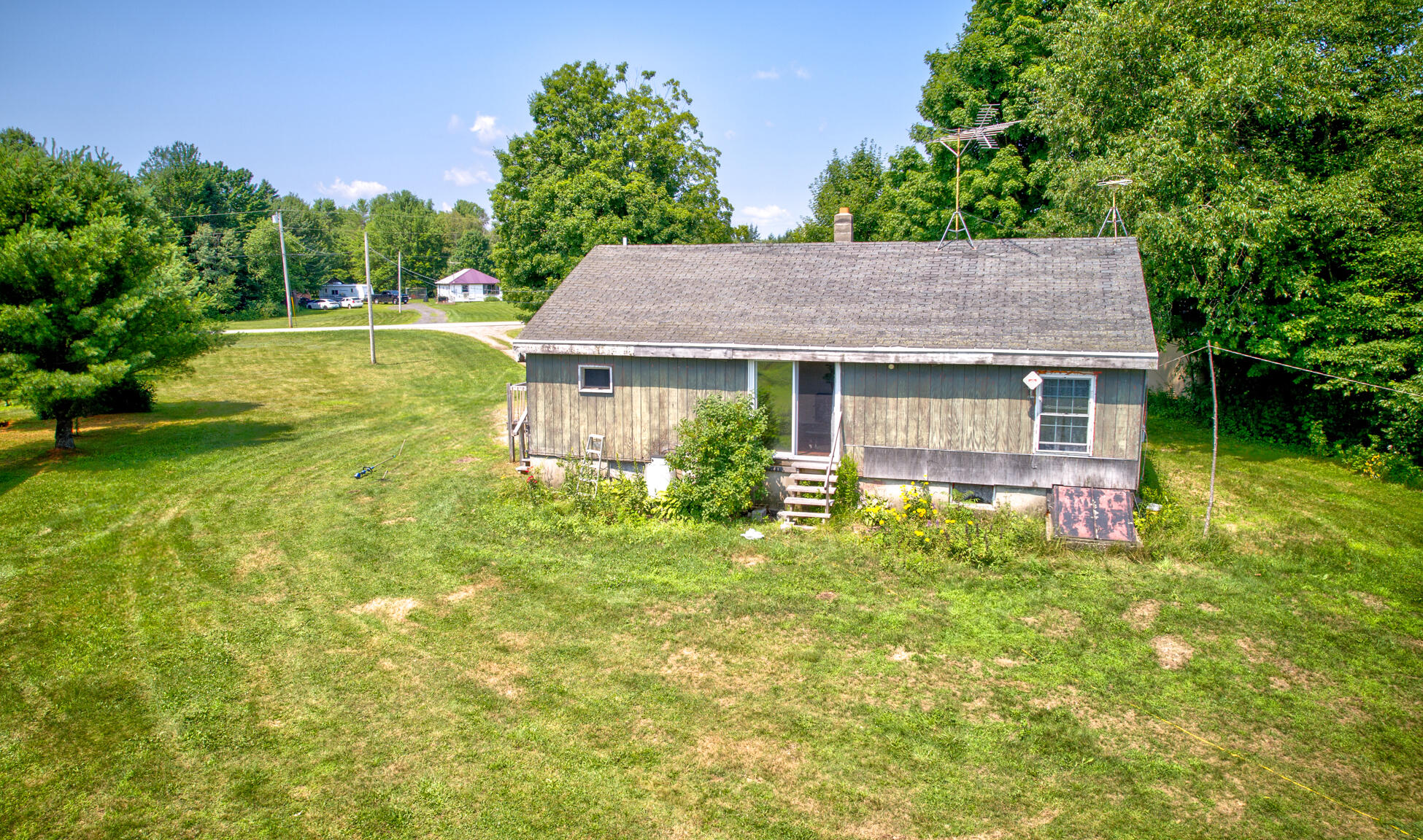 275 Pea Ridge Road Lincoln, ME 04457 - Photo 6 of 25 dji_fly_20240714_112954_593_172098033192
