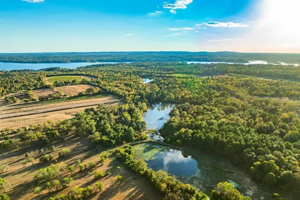 a view of an outdoor space and a lake view