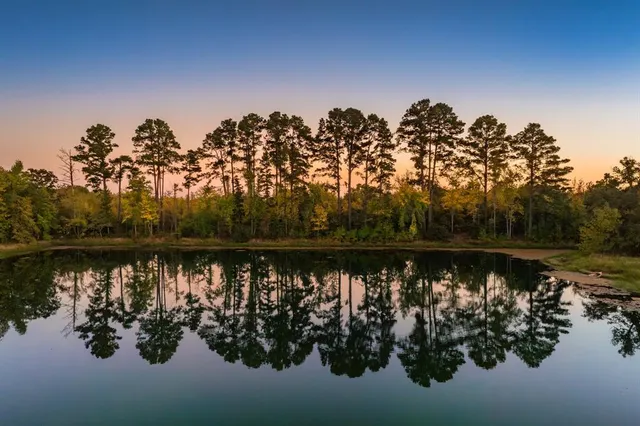 a view of a lake from a mountain
