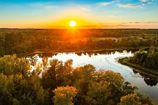 a view of a lake with an outdoor space