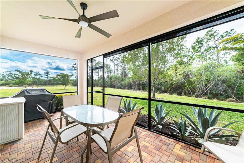 1654 Marton Court Naples, FL 34113 - Photo 12 of 29 Screened lanai overlooks park like setting looking into Rookery Bay Reserve.