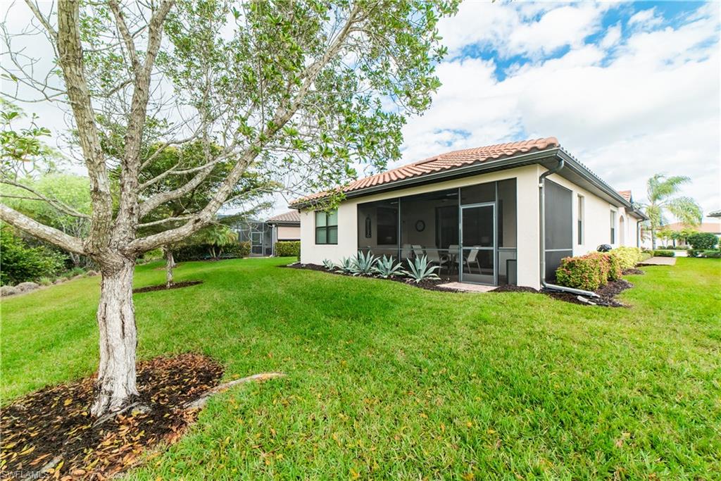 1654 Marton Court Naples, FL 34113 - Photo 18 of 29 Escape into the privacy of this quiet nature filled backyard.