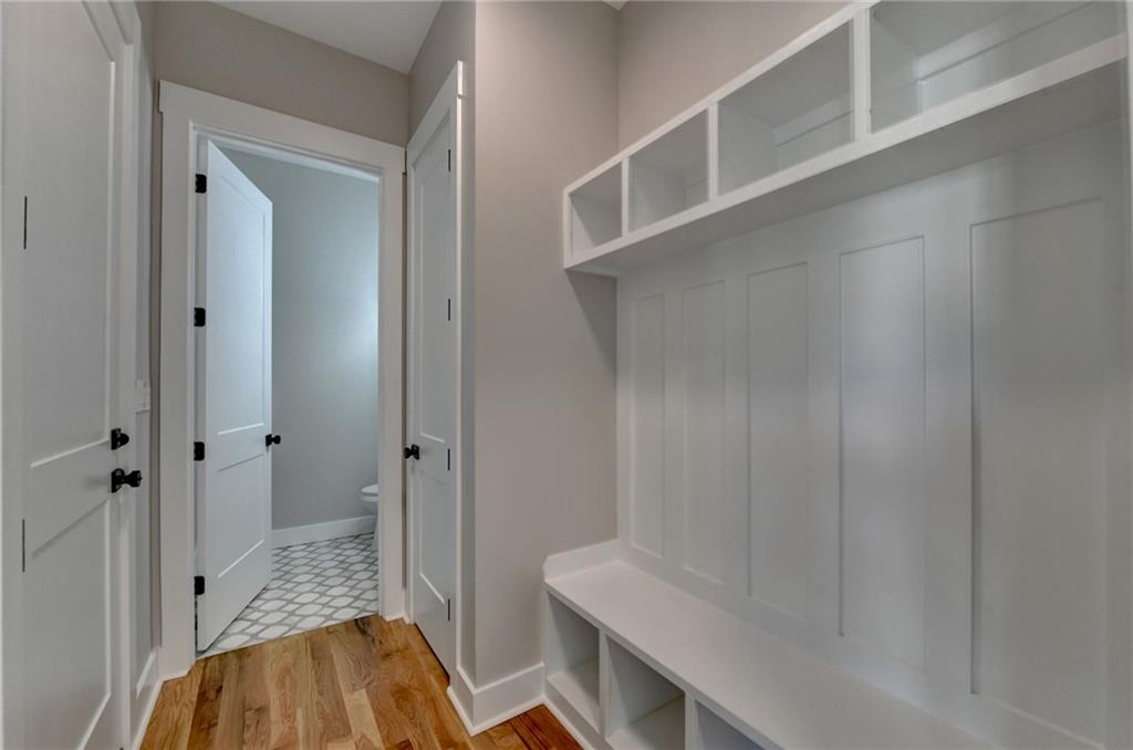 982 Wildberry Court Jefferson, GA 30549 - Photo 11 of 64 a bathroom with a sink and shower