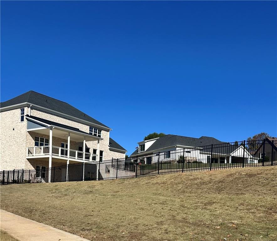982 Wildberry Court Jefferson, GA 30549 - Photo 59 of 64 a front view of a house with a yard
