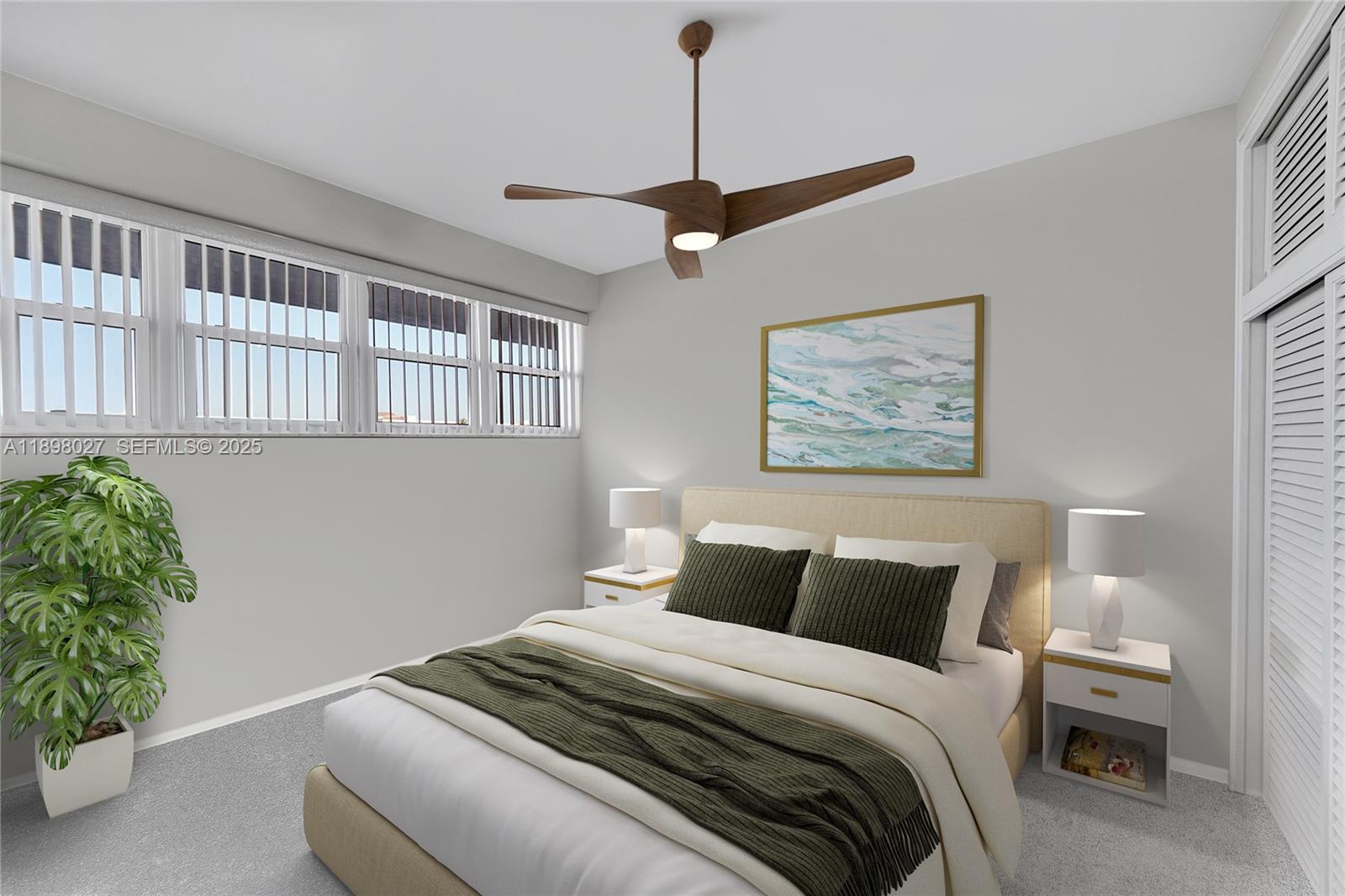 1900 South Ocean Drive, Unit 406 Fort Lauderdale, FL 33316 - Photo 14 of 26 a bedroom with a bed and a potted plant