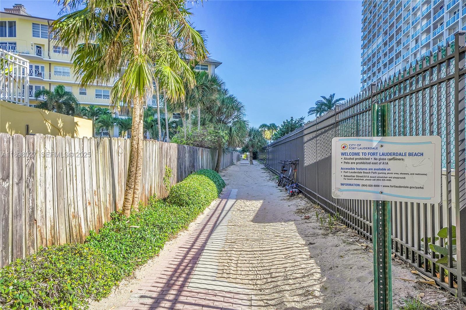 1900 South Ocean Drive, Unit 406 Fort Lauderdale, FL 33316 - Photo 2 of 26 a view of a backyard with a tree
