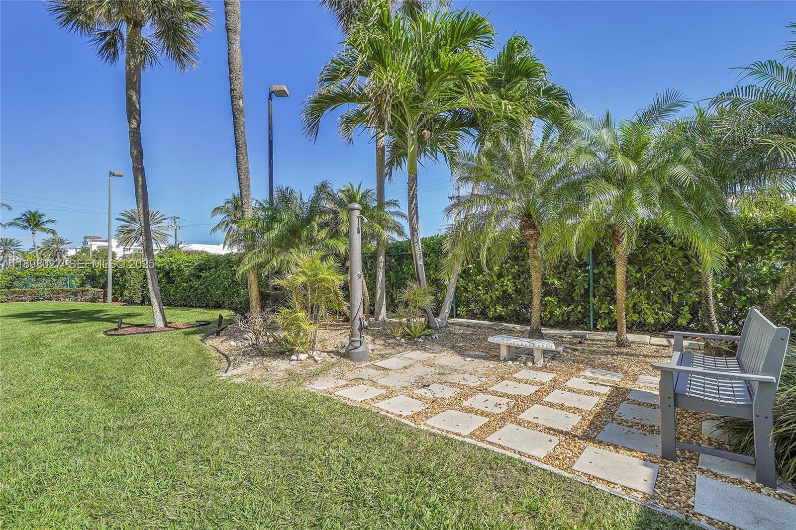 1900 South Ocean Drive, Unit 406 Fort Lauderdale, FL 33316 - Photo 25 of 26 a view of a yard with a tree