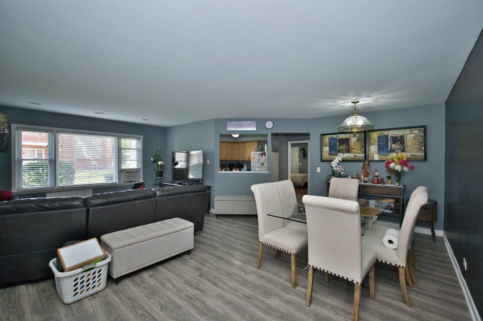 1111 East Algonquin Road, Unit 1 Arlington Heights, IL 60005 - Photo 12 of 42 a living room with furniture and a wooden floor