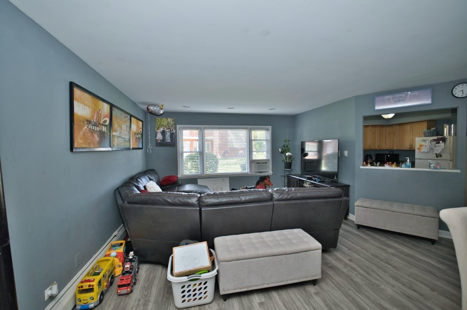 1111 East Algonquin Road, Unit 1 Arlington Heights, IL 60005 - Photo 13 of 42 a living room with furniture and a window