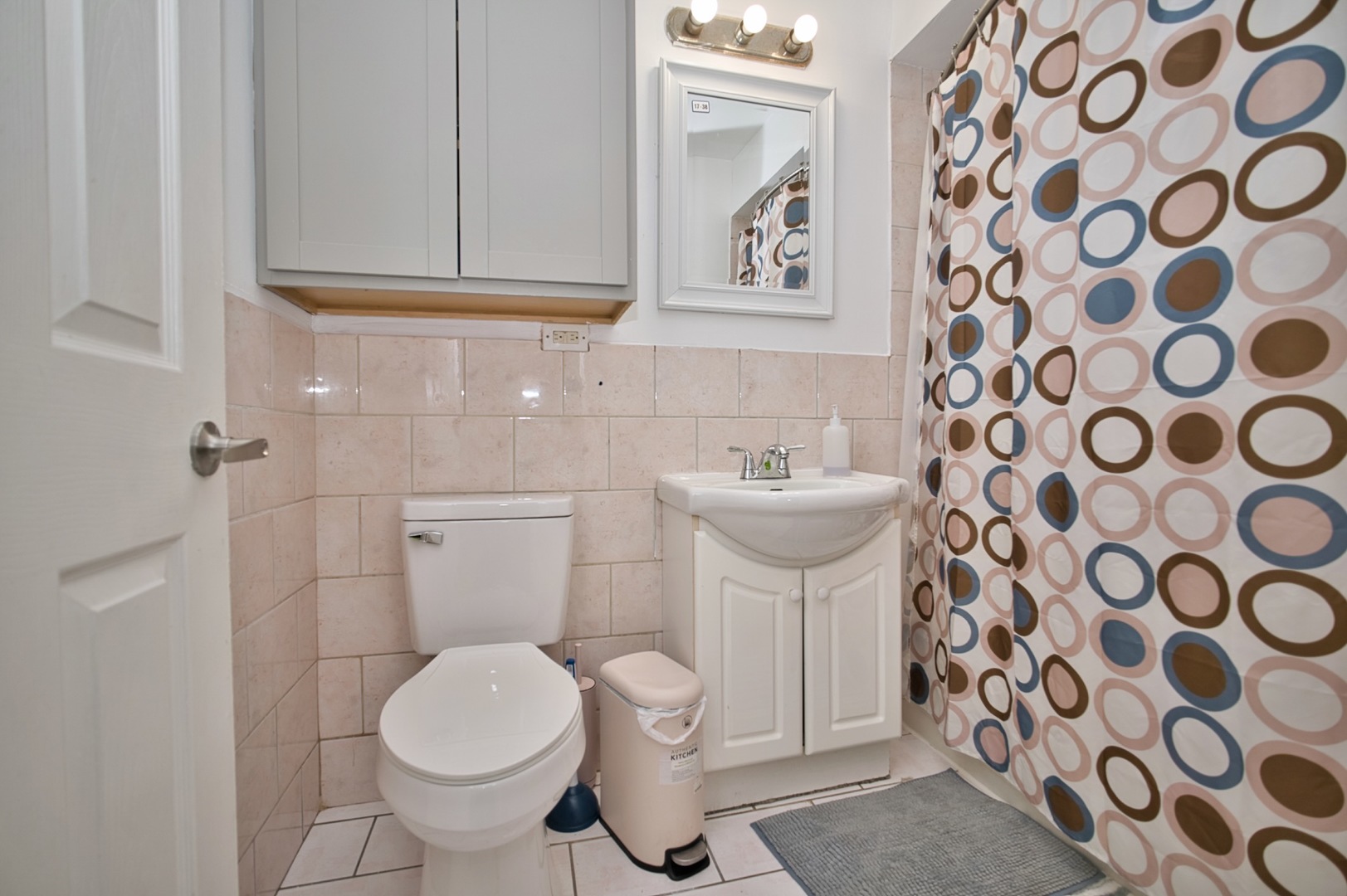 1111 East Algonquin Road, Unit 1 Arlington Heights, IL 60005 - Photo 33 of 42 a bathroom with a toilet and sink