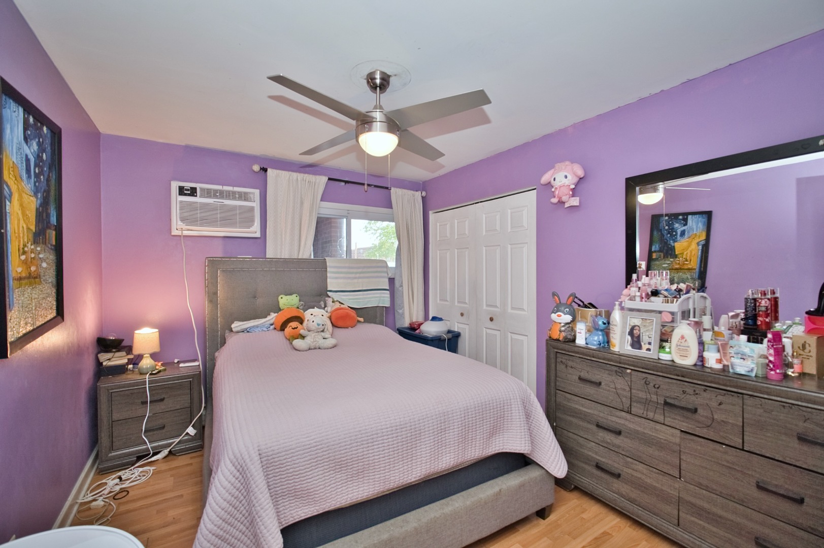 1111 East Algonquin Road, Unit 1 Arlington Heights, IL 60005 - Photo 35 of 42 a bedroom with a bed and a dresser