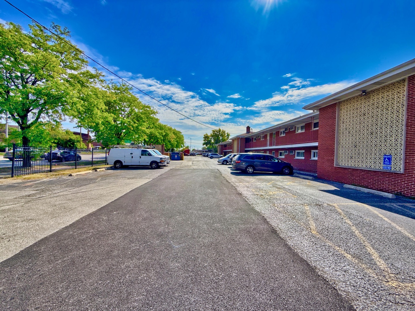 1111 East Algonquin Road, Unit 1 Arlington Heights, IL 60005 - Photo 7 of 42 a view of street with cars