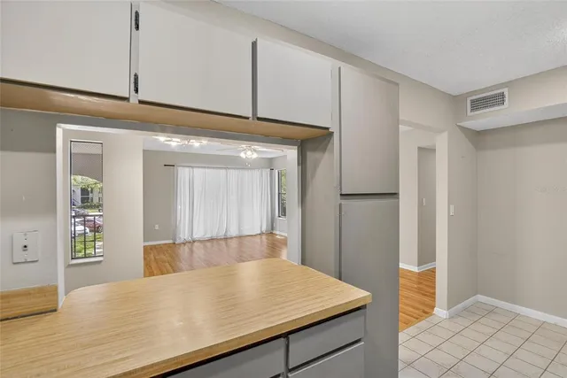 a bathroom with a sink toilet vanity and shower