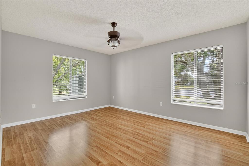 1225 Pine Ridge Circle West, Unit A2 Tarpon Springs, FL 34688 - Photo 26 of 59 a view of an empty room with a window