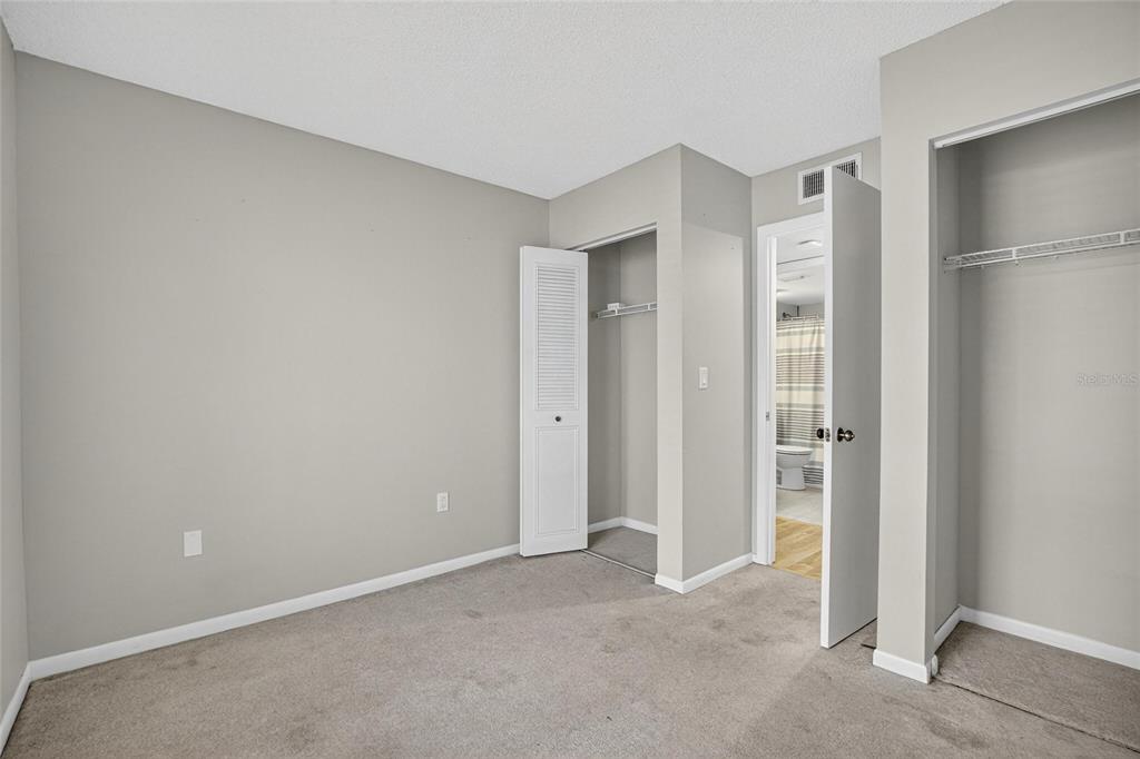 1225 Pine Ridge Circle West, Unit A2 Tarpon Springs, FL 34688 - Photo 31 of 59 a view of an empty room