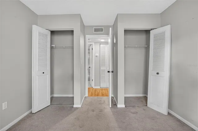 a kitchen with a stove microwave and sink