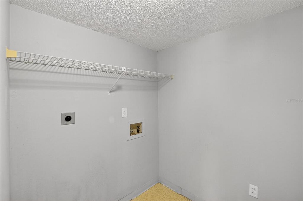 1225 Pine Ridge Circle West, Unit A2 Tarpon Springs, FL 34688 - Photo 36 of 59 a view of a bathroom