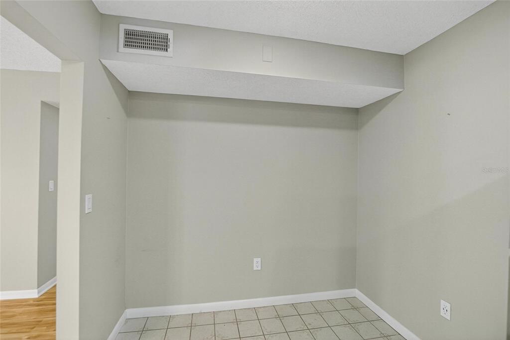 1225 Pine Ridge Circle West, Unit A2 Tarpon Springs, FL 34688 - Photo 37 of 59 a view of an empty room