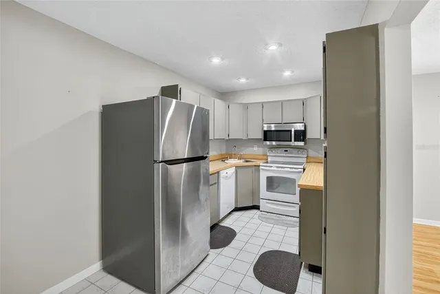 a view of a balcony with wooden floor
